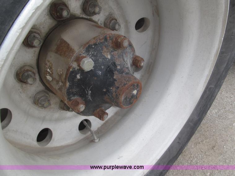 image for item F7122 1985 Mack RD688S Econodyne triple axle semi truck