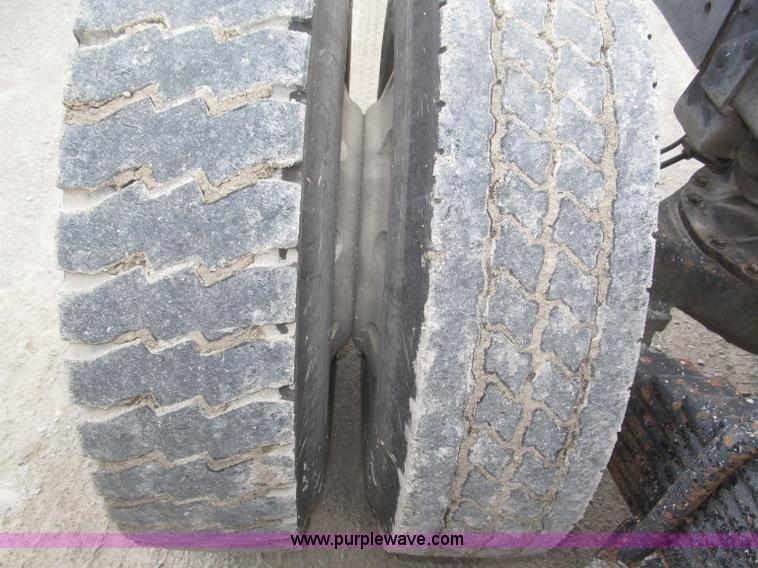 image for item F7122 1985 Mack RD688S Econodyne triple axle semi truck