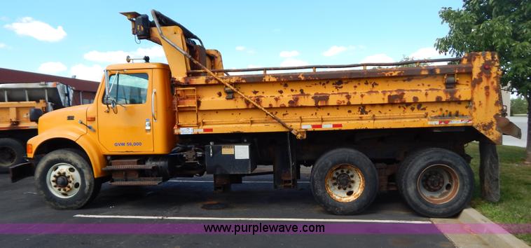 image for item G3483 1999 International 4900 tandem axle dump truck