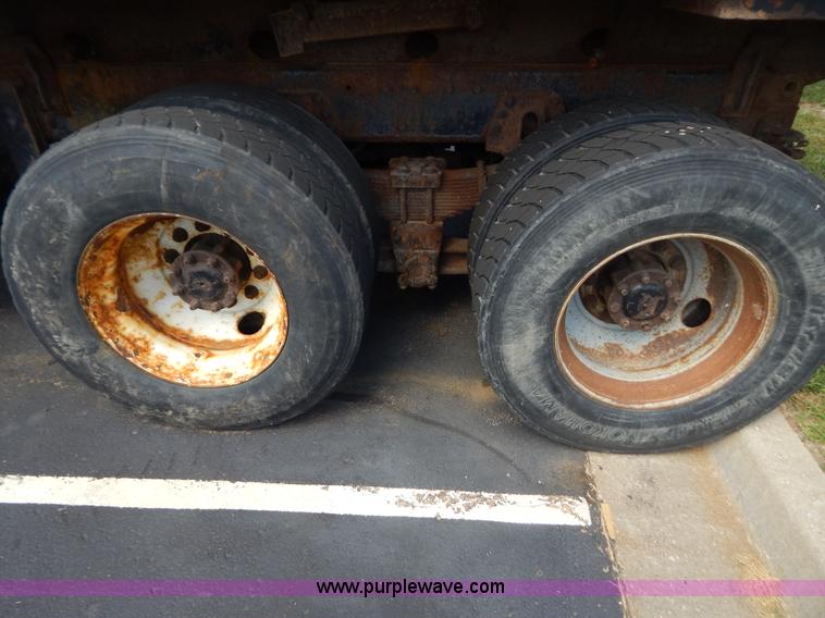 image for item G3483 1999 International 4900 tandem axle dump truck