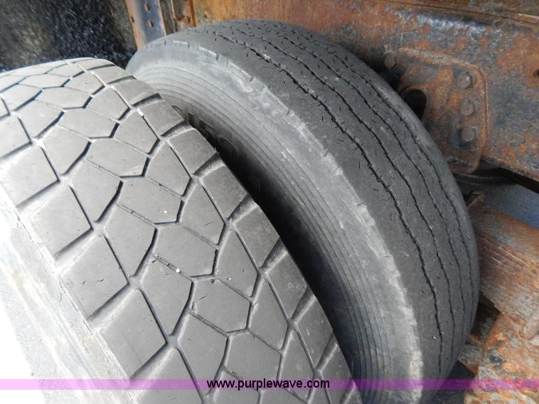 image for item G3483 1999 International 4900 tandem axle dump truck