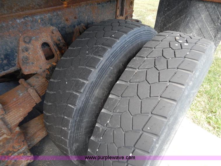 image for item G3483 1999 International 4900 tandem axle dump truck