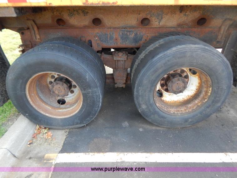 image for item G3483 1999 International 4900 tandem axle dump truck