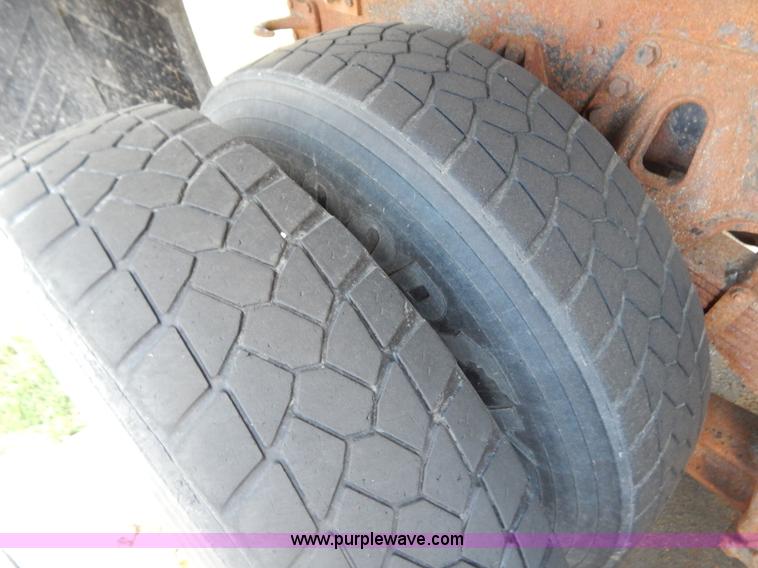 image for item G3483 1999 International 4900 tandem axle dump truck