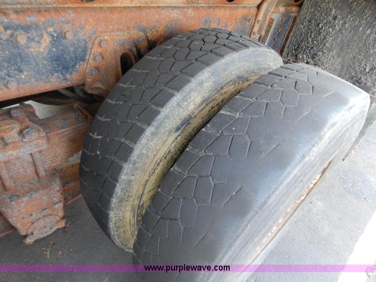 image for item G3483 1999 International 4900 tandem axle dump truck