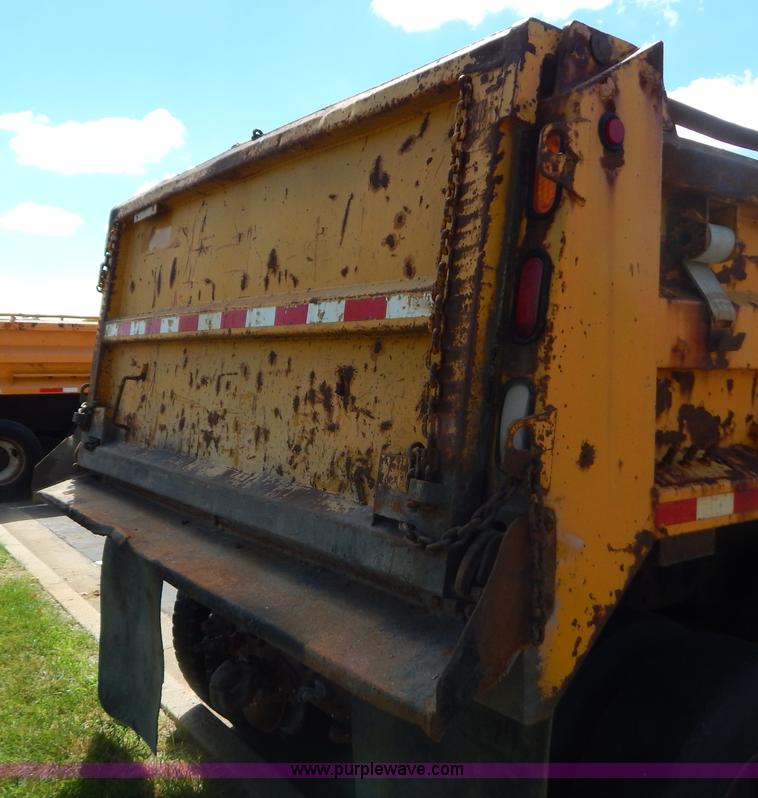 image for item G3483 1999 International 4900 tandem axle dump truck
