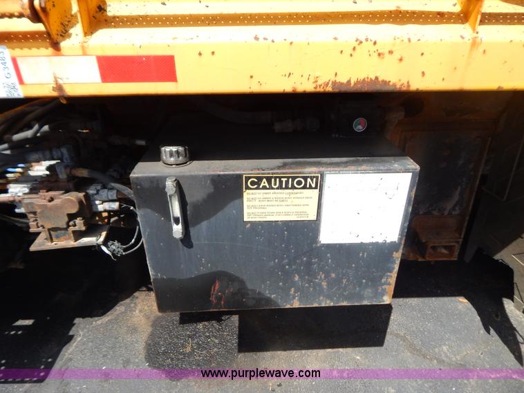 image for item G3483 1999 International 4900 tandem axle dump truck