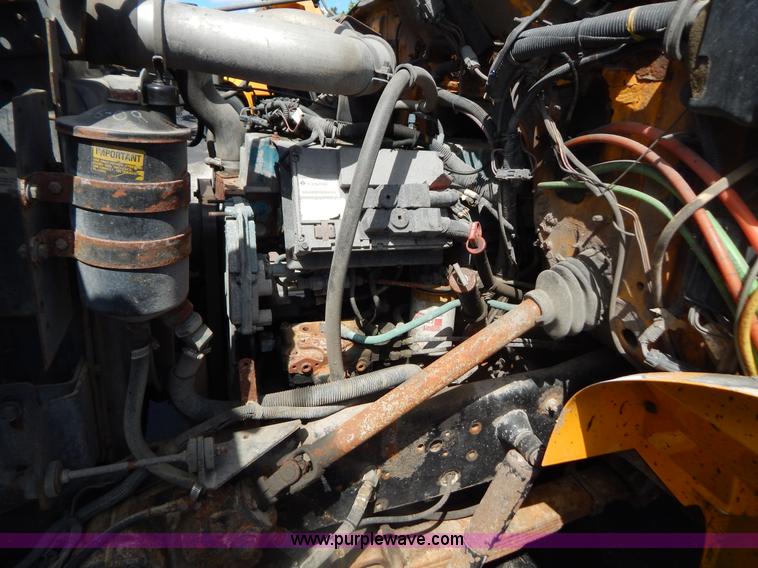 image for item G3483 1999 International 4900 tandem axle dump truck