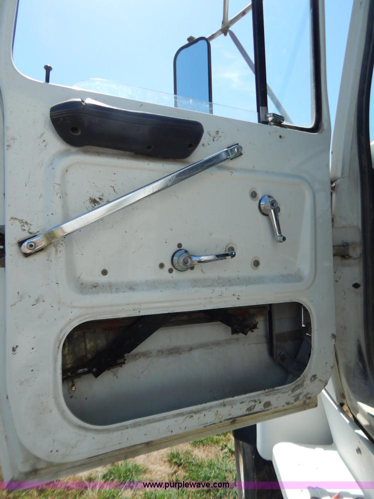 image for item G3496 1993 Ford LT8000 9 cu. yd. concrete mixer