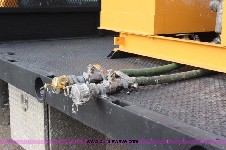 image for item H6687 1997 Ford F450 XL Super Duty flatbed truck with paint striping unit