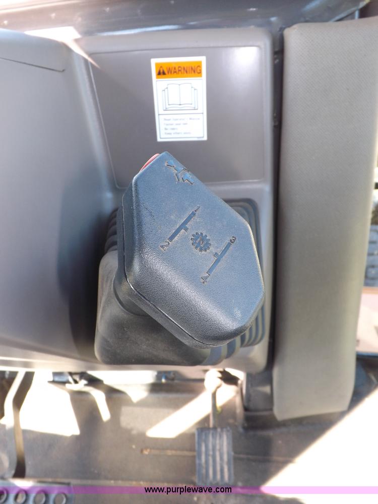 image for item I7618 2003 Case 570M XT landscape loader