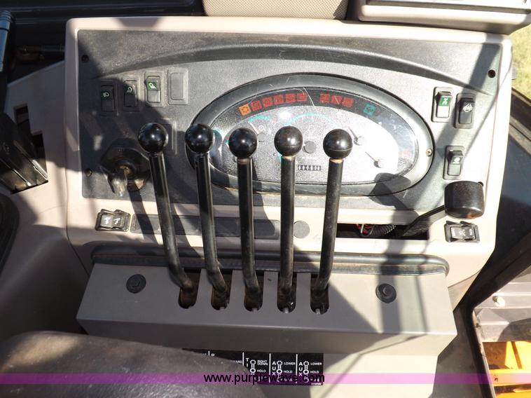 image for item I7618 2003 Case 570M XT landscape loader