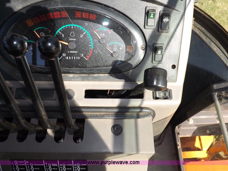 image for item I7618 2003 Case 570M XT landscape loader