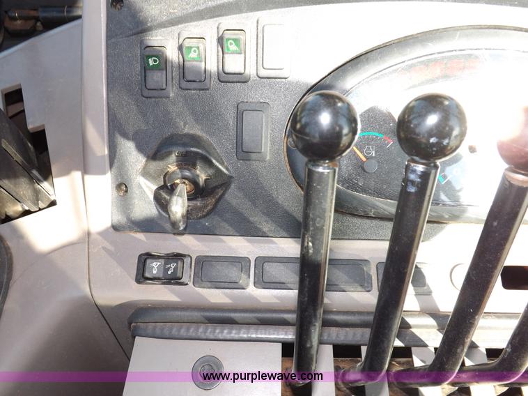 image for item I7618 2003 Case 570M XT landscape loader