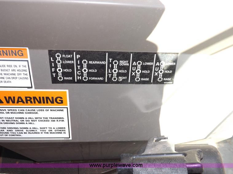 image for item I7618 2003 Case 570M XT landscape loader