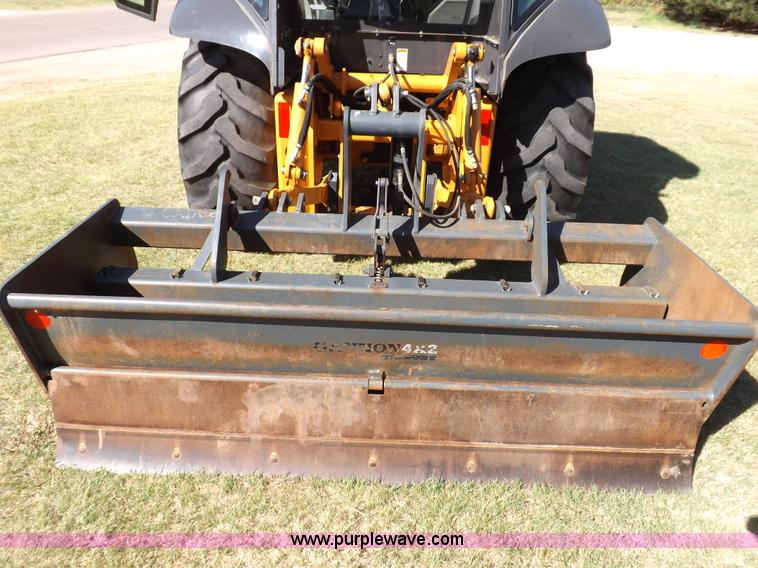 image for item I7618 2003 Case 570M XT landscape loader