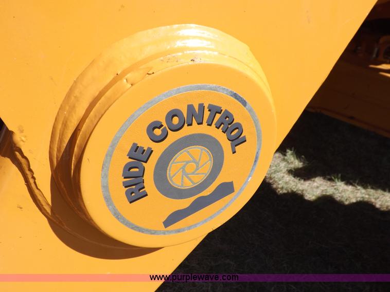 image for item I7618 2003 Case 570M XT landscape loader