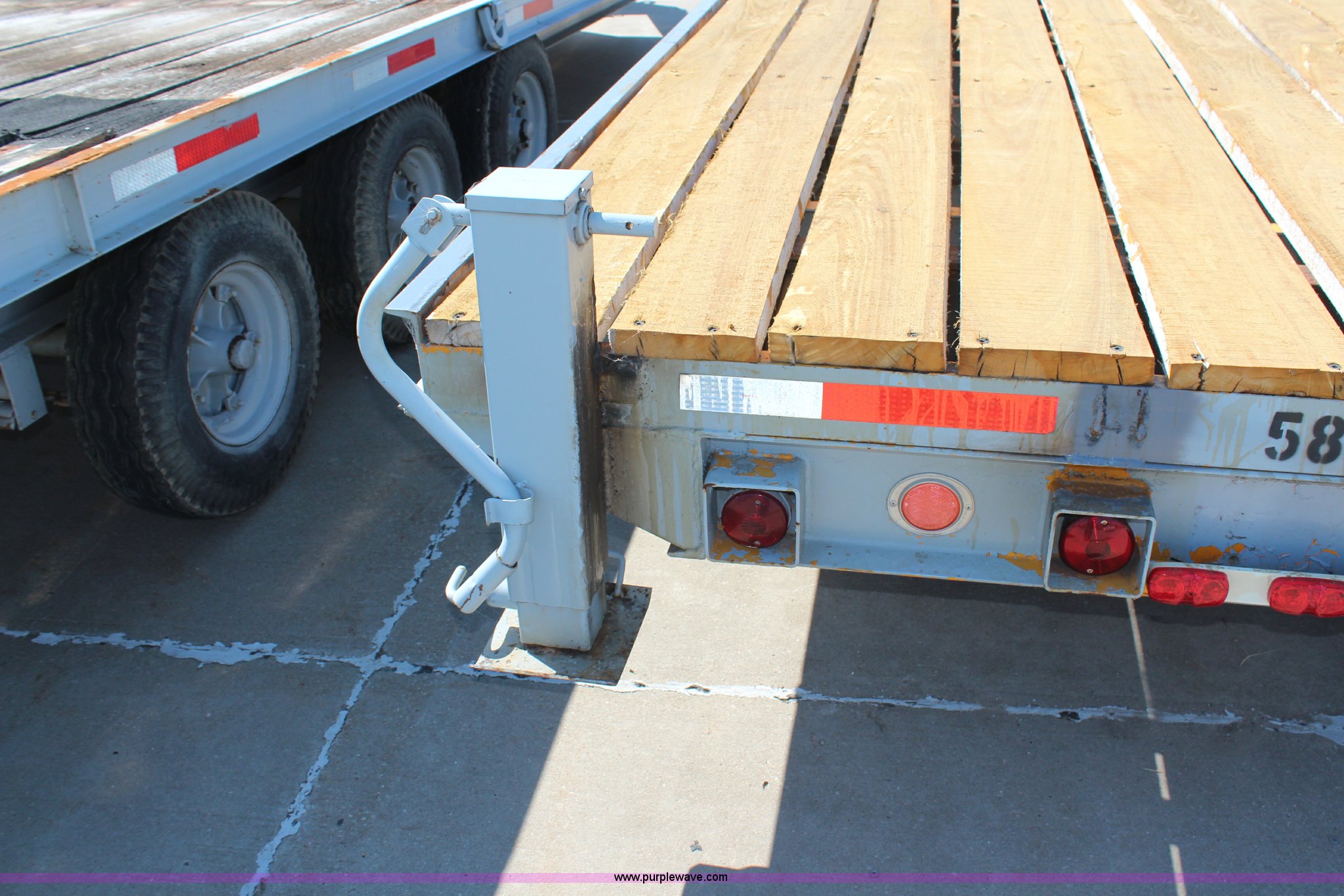 1989 Hudson triple axle flatbed trailer in Topeka, KS Item H6621 sold