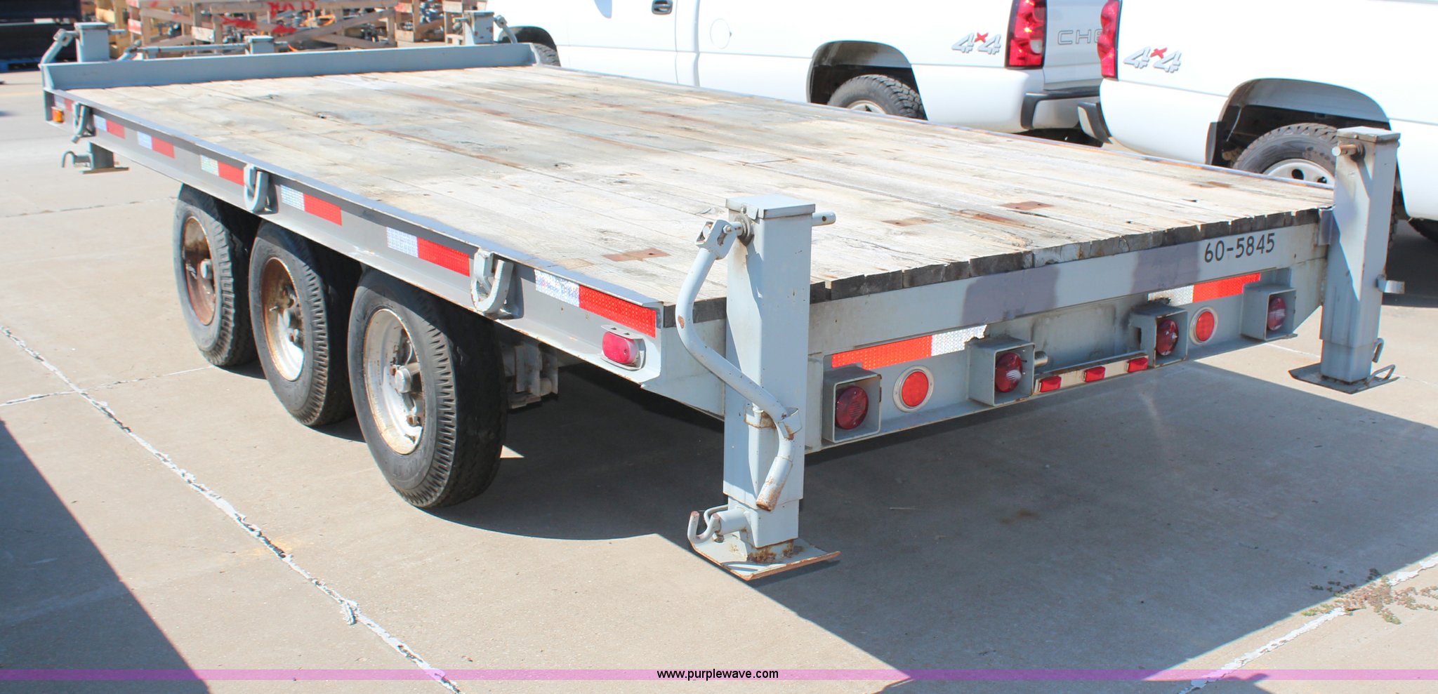 1989 Hudson triple axle flatbed trailer in Topeka, KS Item H6622 sold Purple Wave