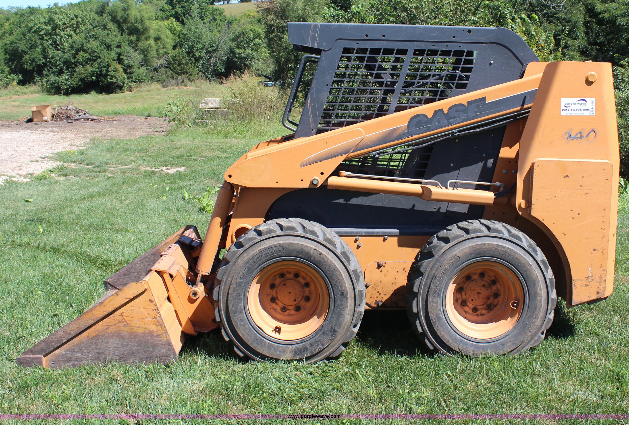 2005 Case 440 skid steer in Auburn, KS Item H6683 sold Purple Wave