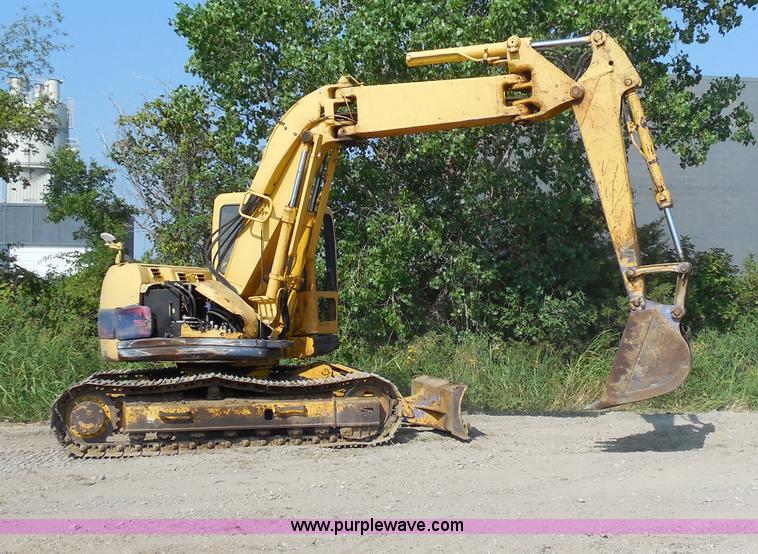 image for item E7625 1997 Komatsu PC128UU-1 Avance mini excavator