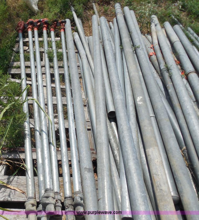 image for item E7652 Approximately 100 assorted galvanized metal fence posts