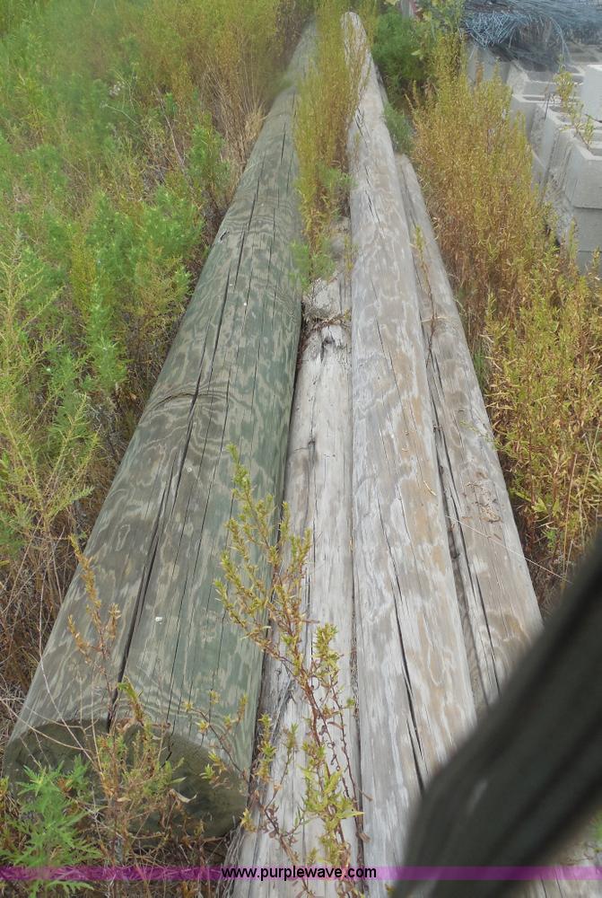 image for item E7706 Wood telephone poles