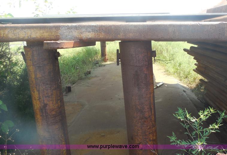 image for item E7722 Assorted 20'L x 4'W x 7'10"H shoring pieces