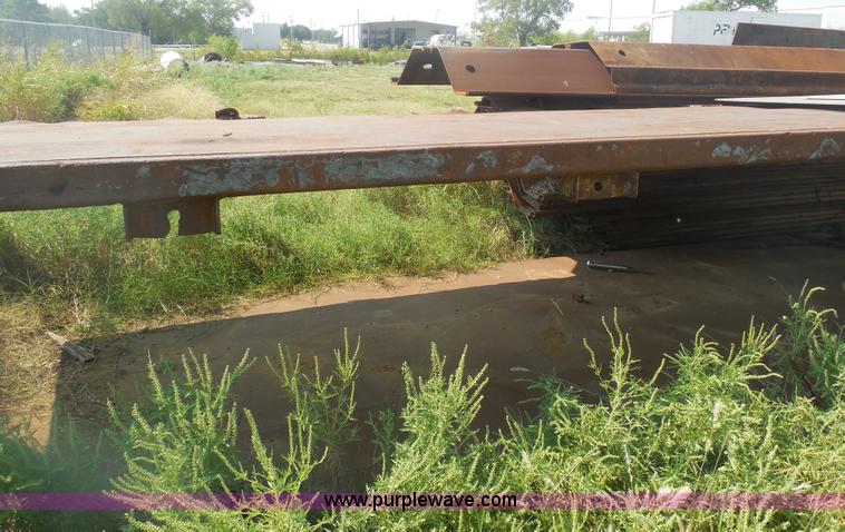 image for item E7722 Assorted 20'L x 4'W x 7'10"H shoring pieces