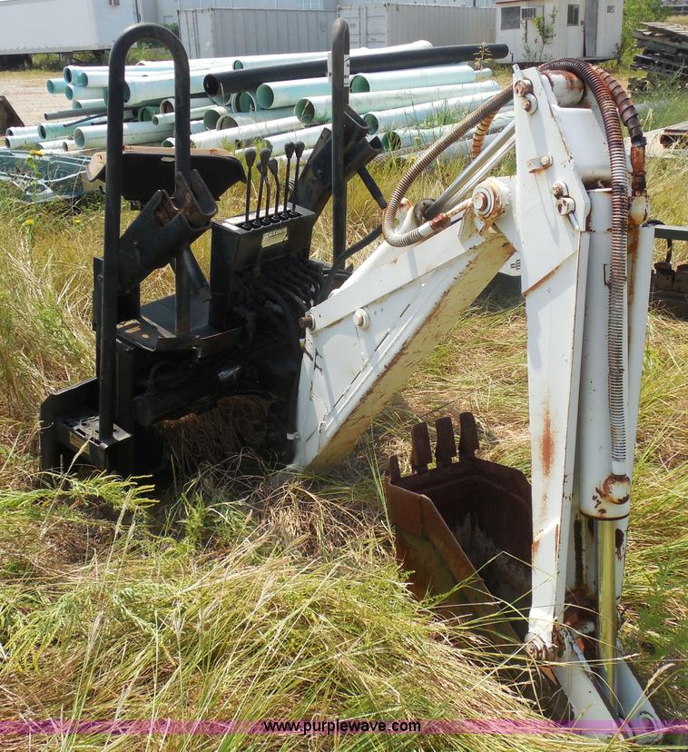 image for item I1433 Skid steer hydraulic backhoe attachment