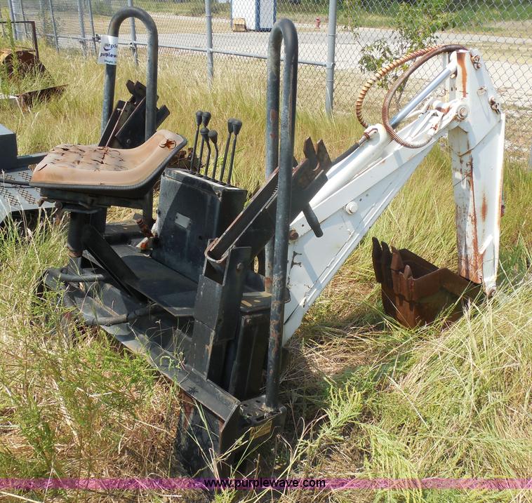 image for item I1433 Skid steer hydraulic backhoe attachment