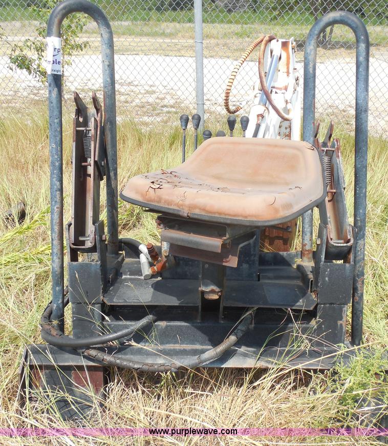 image for item I1433 Skid steer hydraulic backhoe attachment