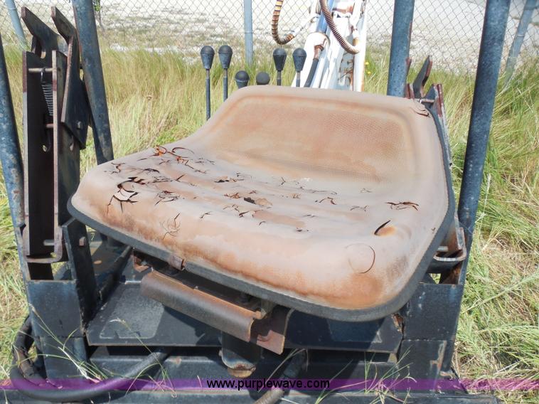 image for item I1433 Skid steer hydraulic backhoe attachment