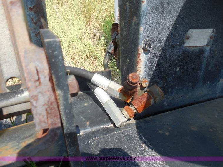 image for item I1433 Skid steer hydraulic backhoe attachment