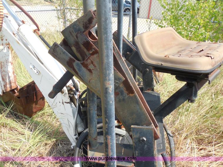 image for item I1433 Skid steer hydraulic backhoe attachment