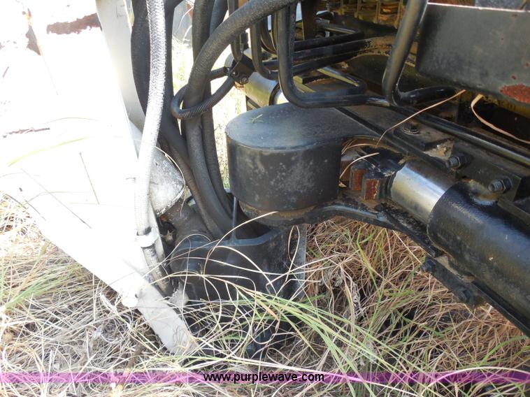 image for item I1433 Skid steer hydraulic backhoe attachment