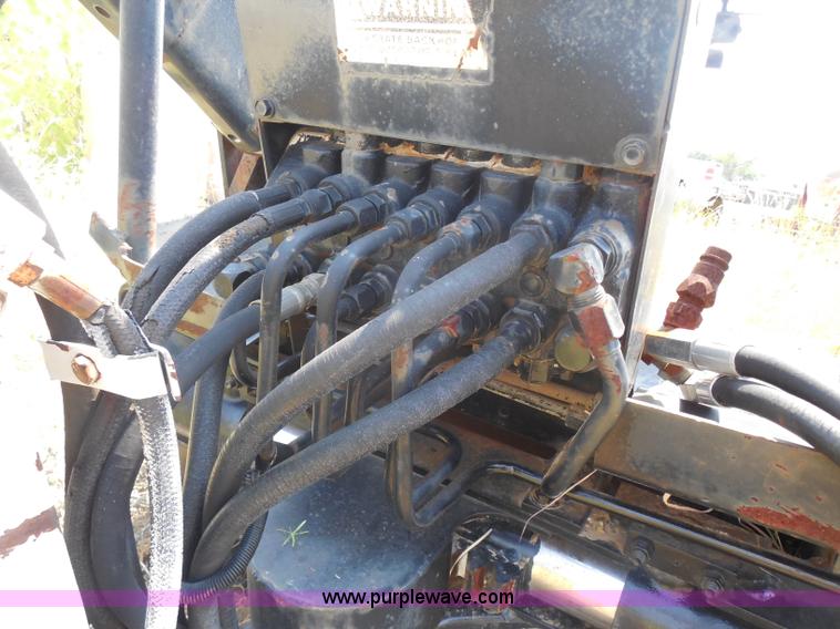 image for item I1433 Skid steer hydraulic backhoe attachment