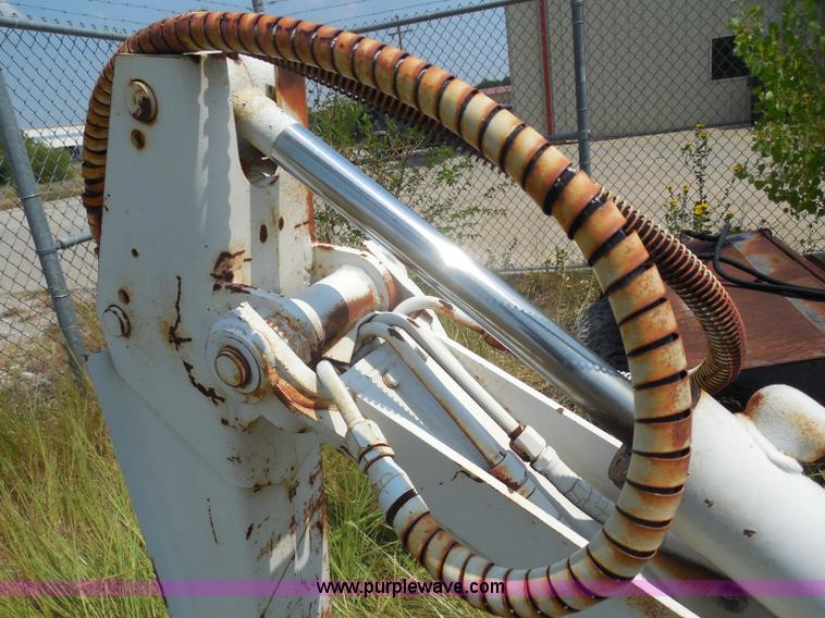 image for item I1433 Skid steer hydraulic backhoe attachment