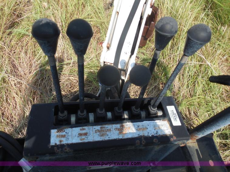 image for item I1433 Skid steer hydraulic backhoe attachment