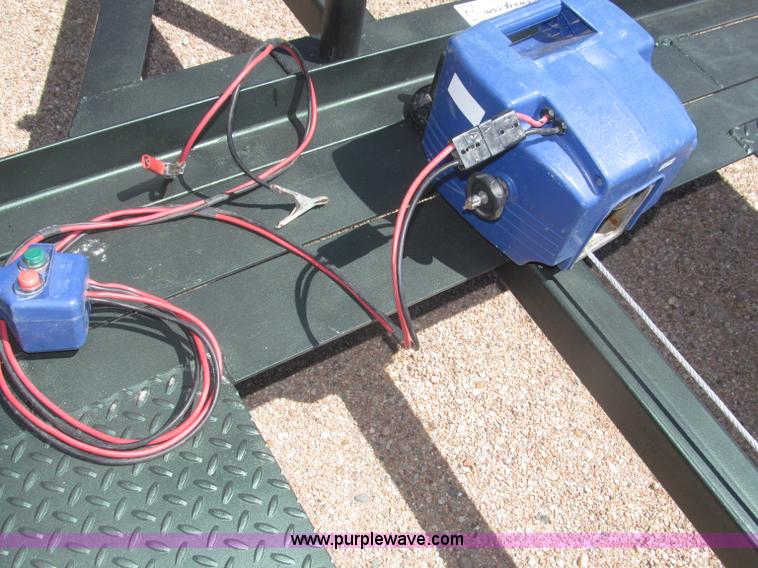 image for item F7004 2001 shop built tandem axle trailer