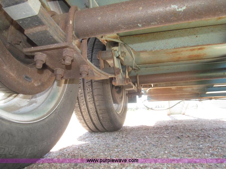 image for item F7004 2001 shop built tandem axle trailer