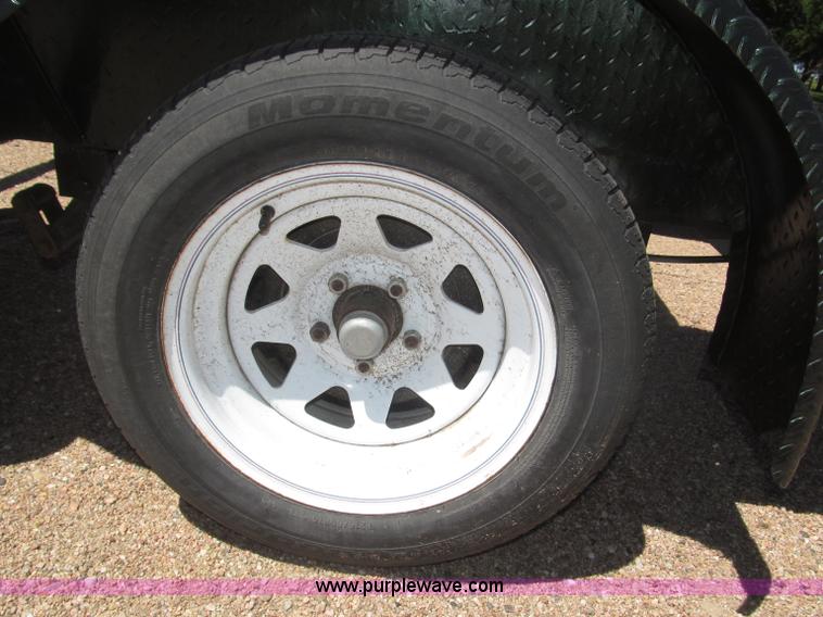 image for item F7004 2001 shop built tandem axle trailer