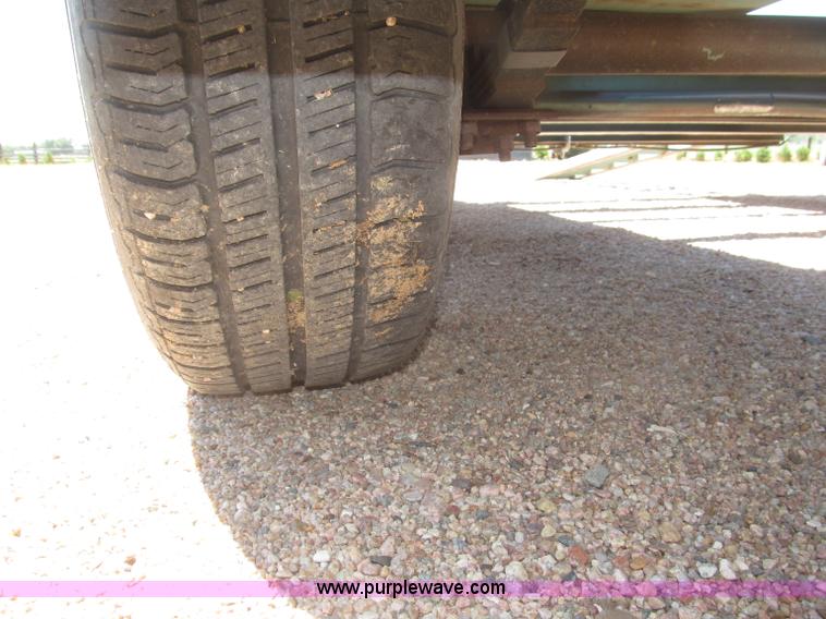 image for item F7004 2001 shop built tandem axle trailer