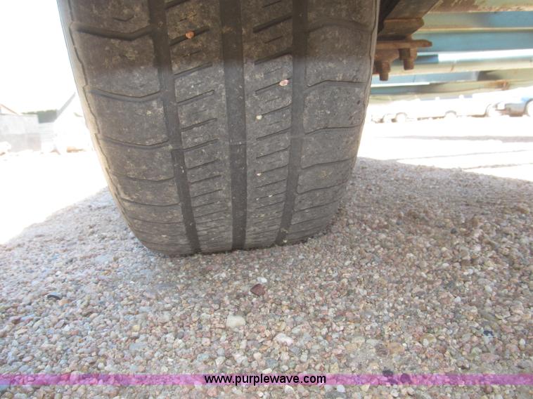 image for item F7004 2001 shop built tandem axle trailer