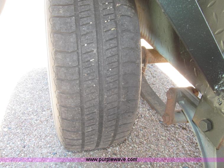 image for item F7004 2001 shop built tandem axle trailer