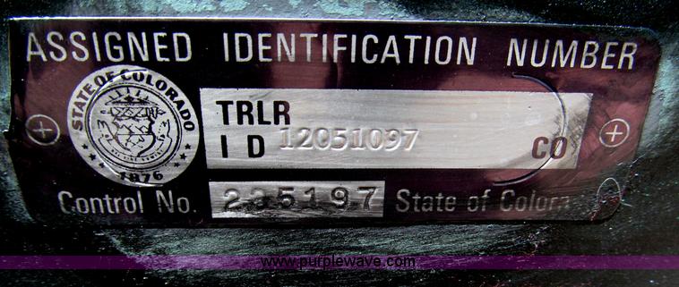 image for item F7004 2001 shop built tandem axle trailer