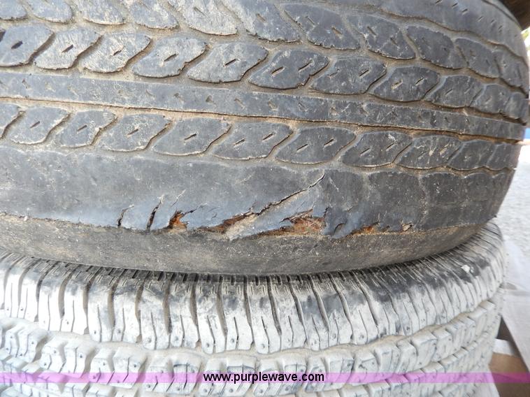 image for item AV9537 (3) used 195/75R14 tires and wheels