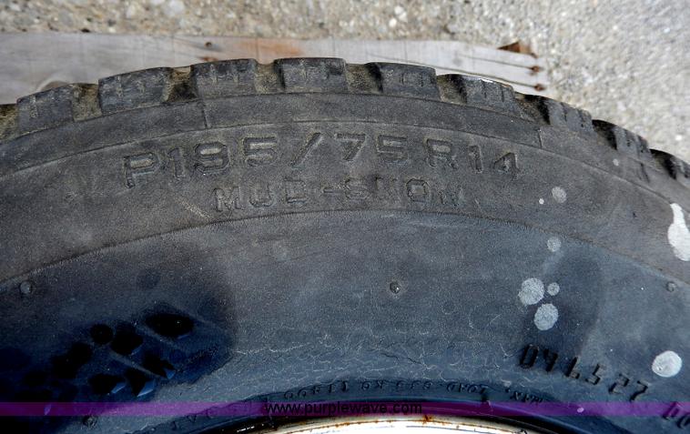 image for item AV9537 (3) used 195/75R14 tires and wheels