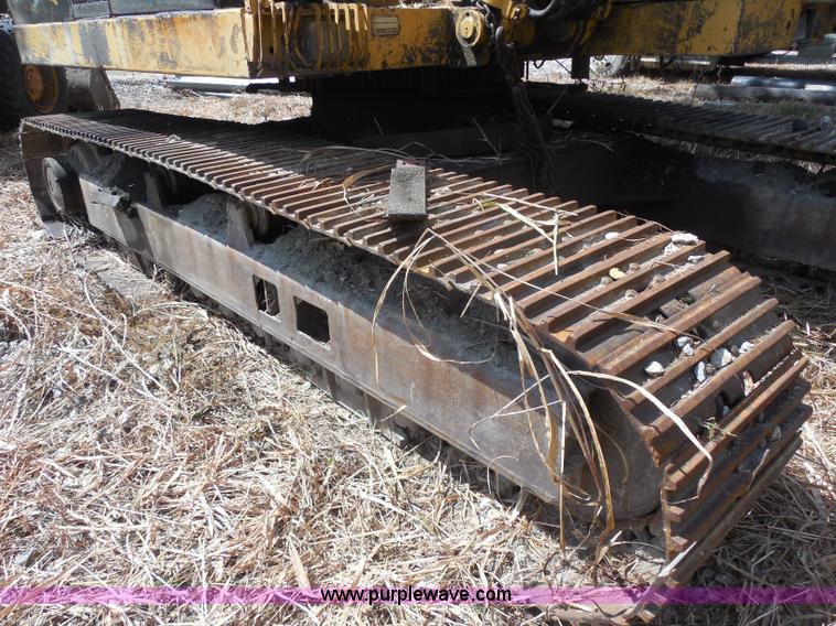 image for item H9760 1985 Caterpillar 211 LC excavator