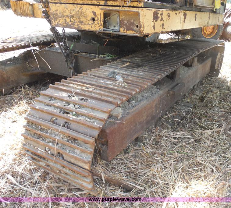 image for item H9760 1985 Caterpillar 211 LC excavator